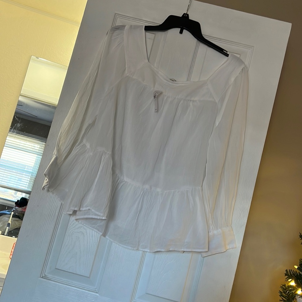 new white blouse . never worn . non smoking home size XL